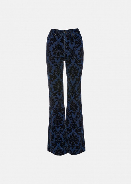 Flared jeans with an embossed velvet paisley print