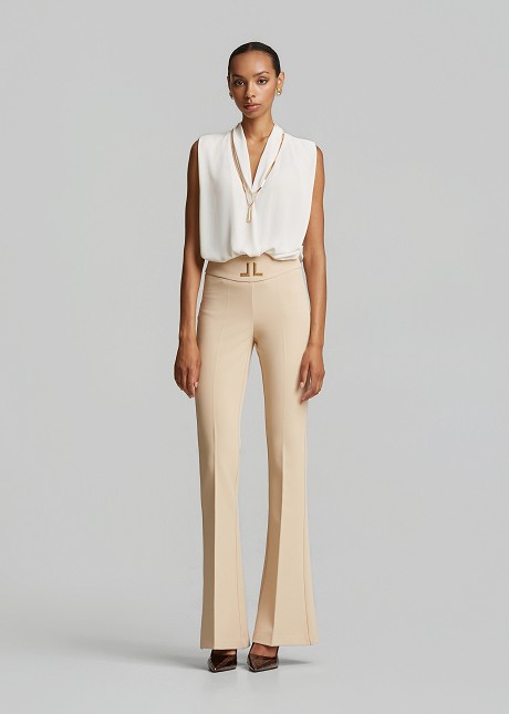 High-waisted flared crepe trousers