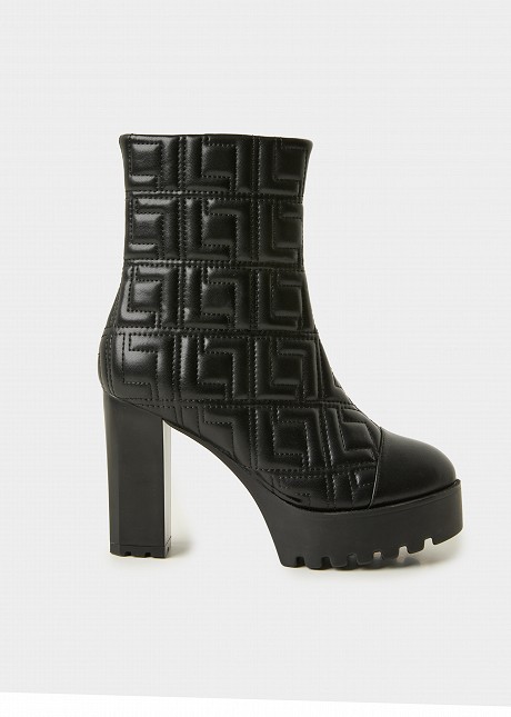 High-heeled quilted boots