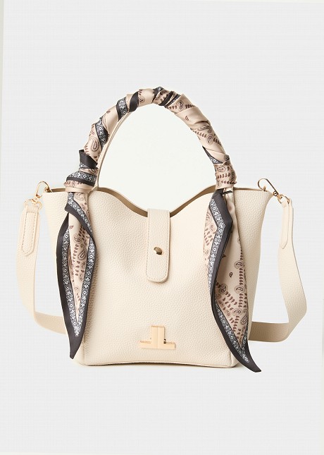 Handbag with a decorative scarf