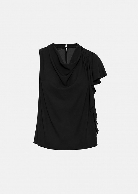 One-sleeve top with decorative ruffles