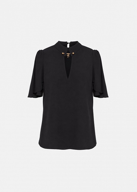 Blouse with flared sleeves