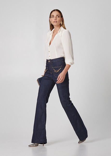 Flared jeans with decorative chains
