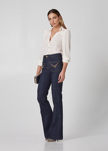 Flared jeans with decorative chains