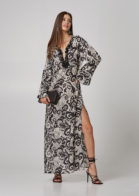 Maxi caftan with paisley prints and decorative detail on the neckline
