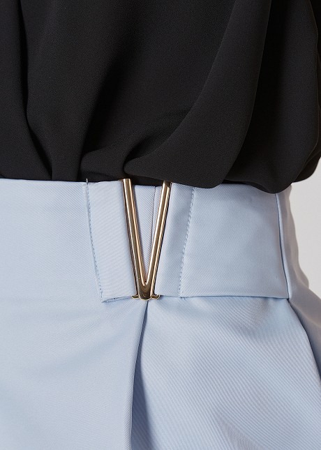 Shorts with decorative metalic elements