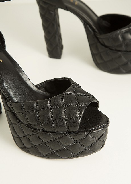 Quilted high heeled sandals with platform sole