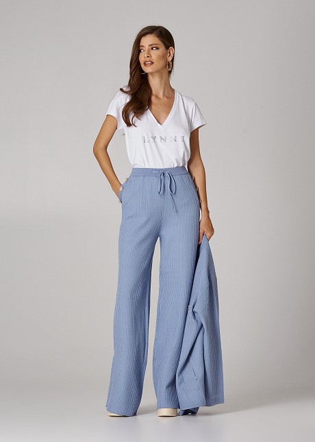 Knitted trousers with decorative buttons