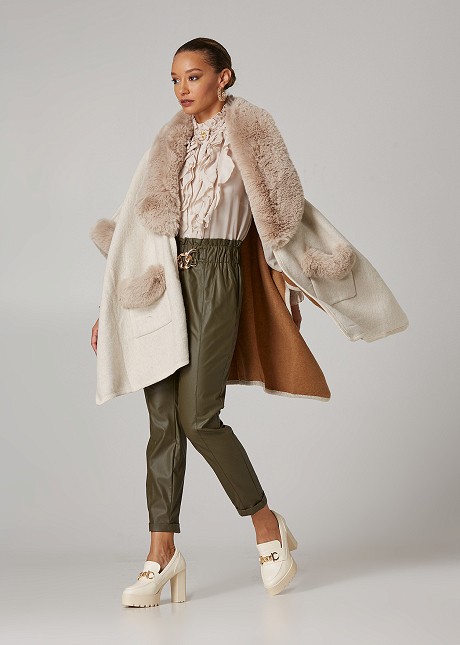 Cape with fur details and pockets