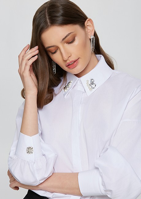 Shirt decorated with pearls and rhinestones