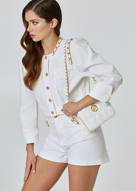 White denim jacket with chains