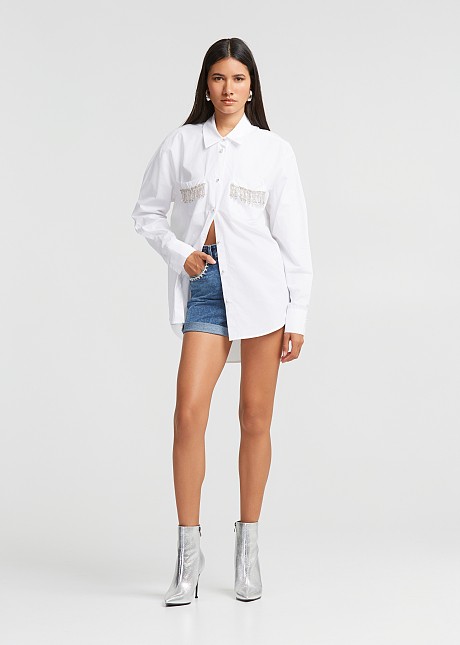 Long shirt with rhinestones at the pockets