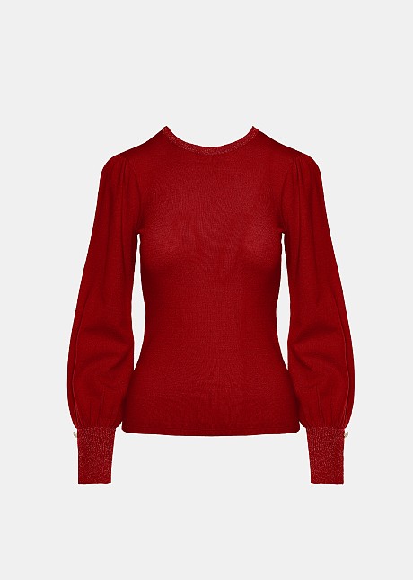 Knitted blouse with strass on the neck and on the sleeves