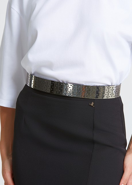 Metal rigid belt with cut outs
