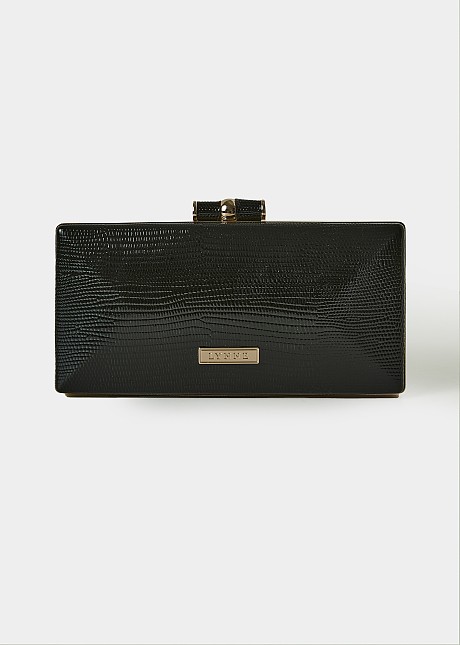 Clutch bag in shiny embossed