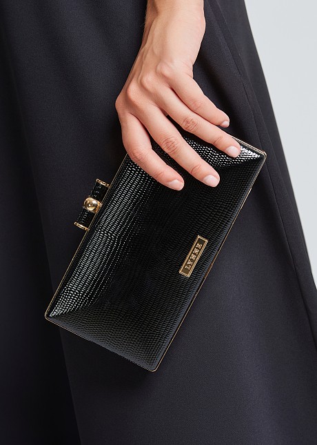 Clutch bag in shiny embossed