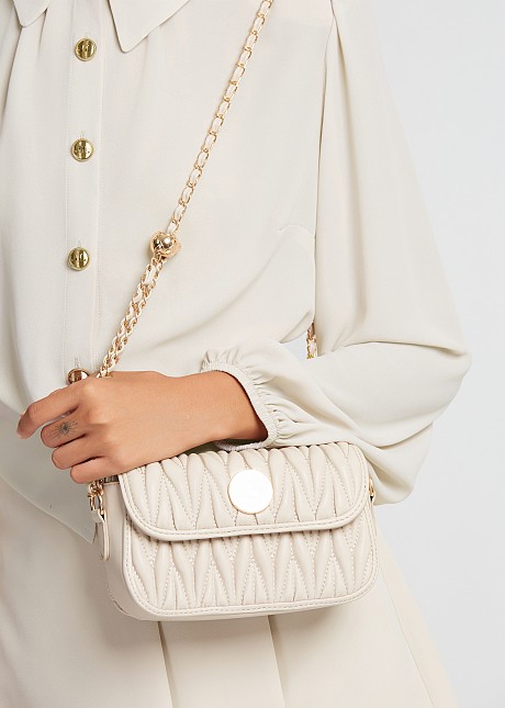 Mini quilted bag in leather look