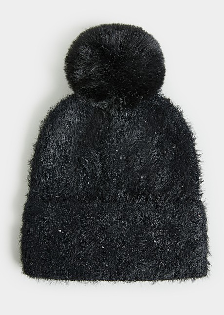 Knitted lurex cap with pom pom