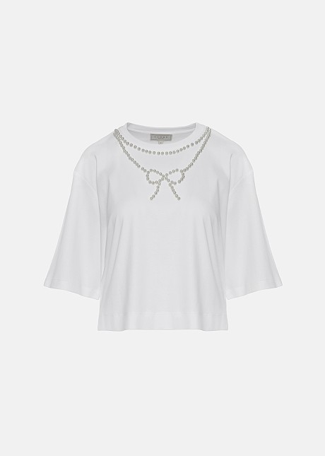 Crop top with a pearl-adorned bow detail