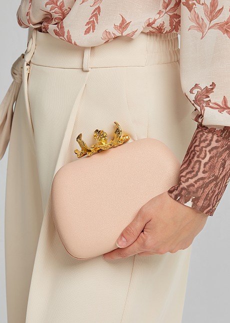 Clutch bag in embossed metal flower clasp | LYNNE