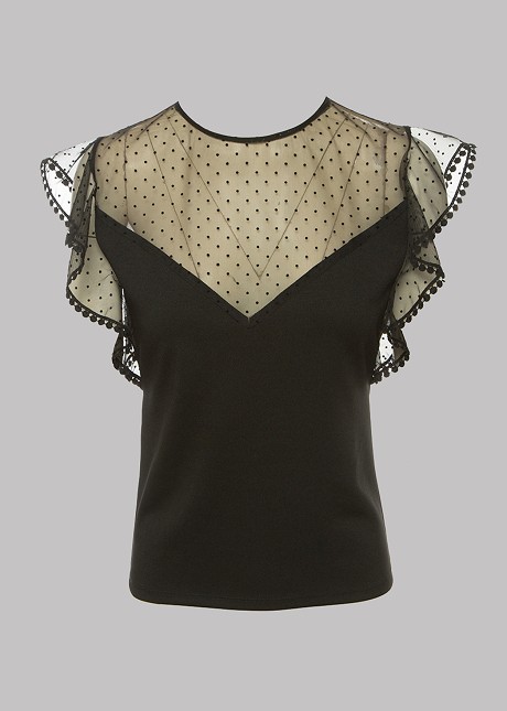 Dotted top with ruffles on the sleeves