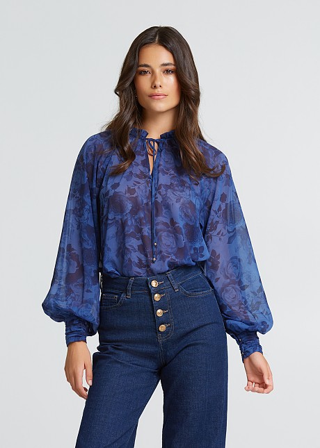 Floral blouse with ruffles on the neck