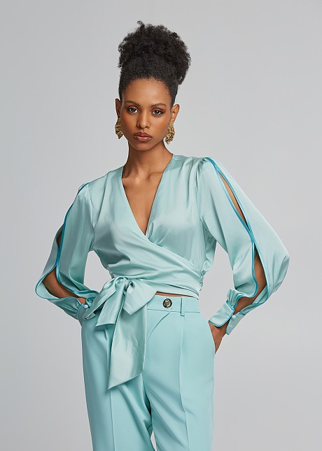 Wrap blouse with cut on the sleeves