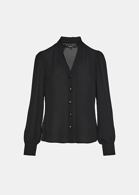 Shirt with ruffles on the collar