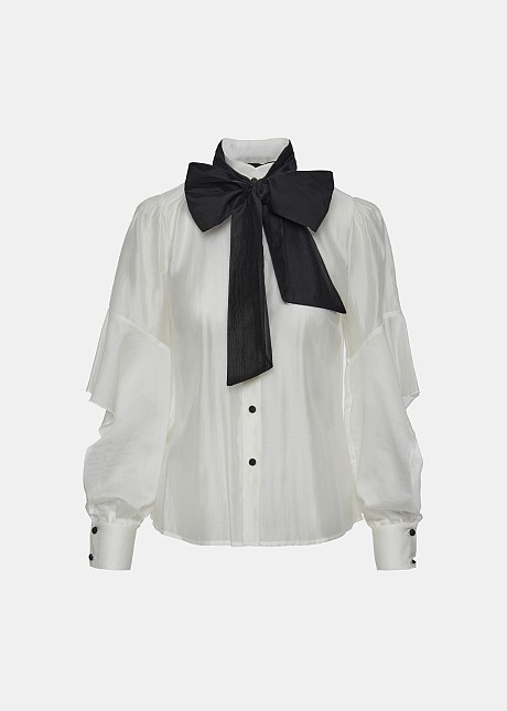 Shirt with a bow and cut on the sleeves