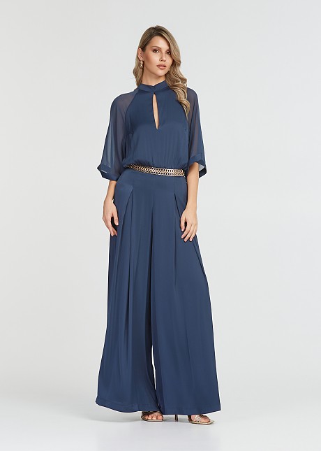 Jumpsuit with mesh fabric on the sleeves