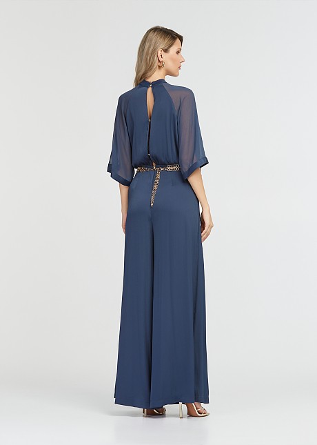 Jumpsuit with mesh fabric on the sleeves