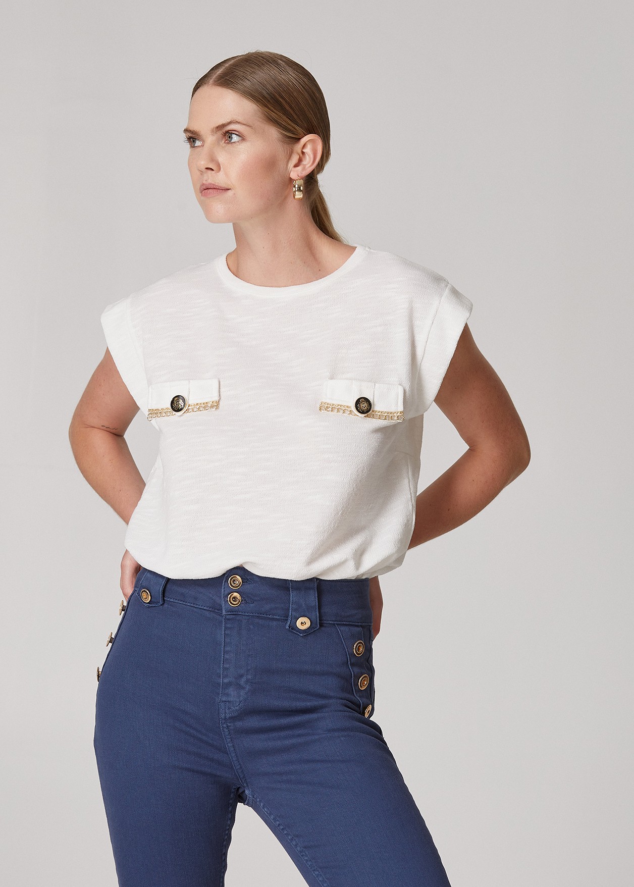 Blouse with decorative pockets