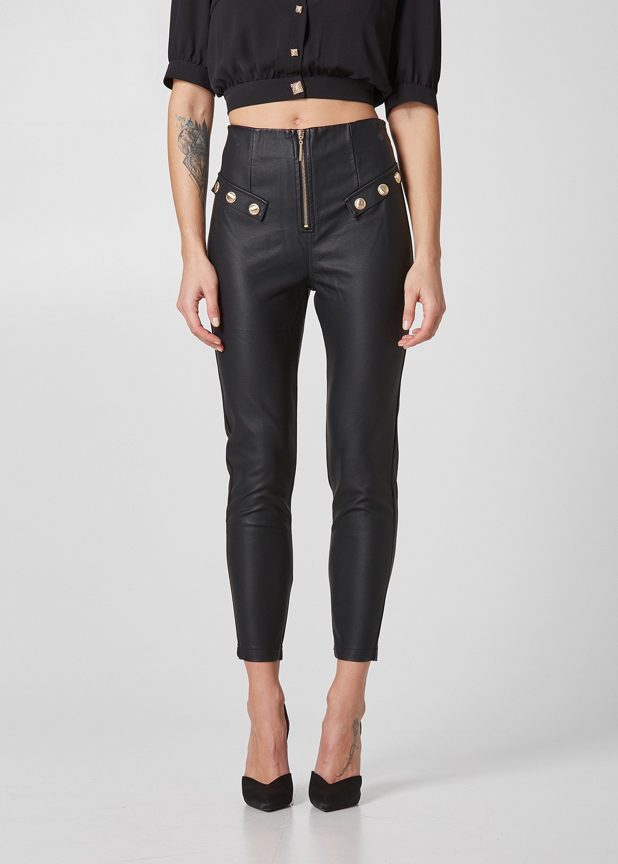 Leather look trousers with zip