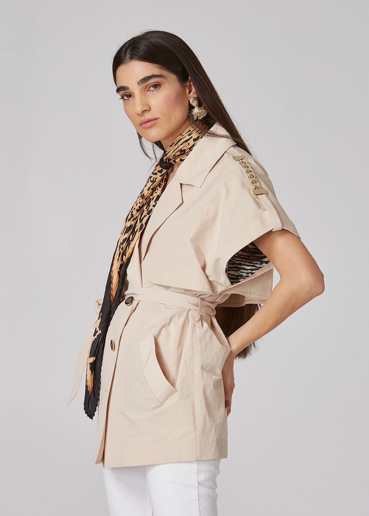 Trench coat with decorative chains