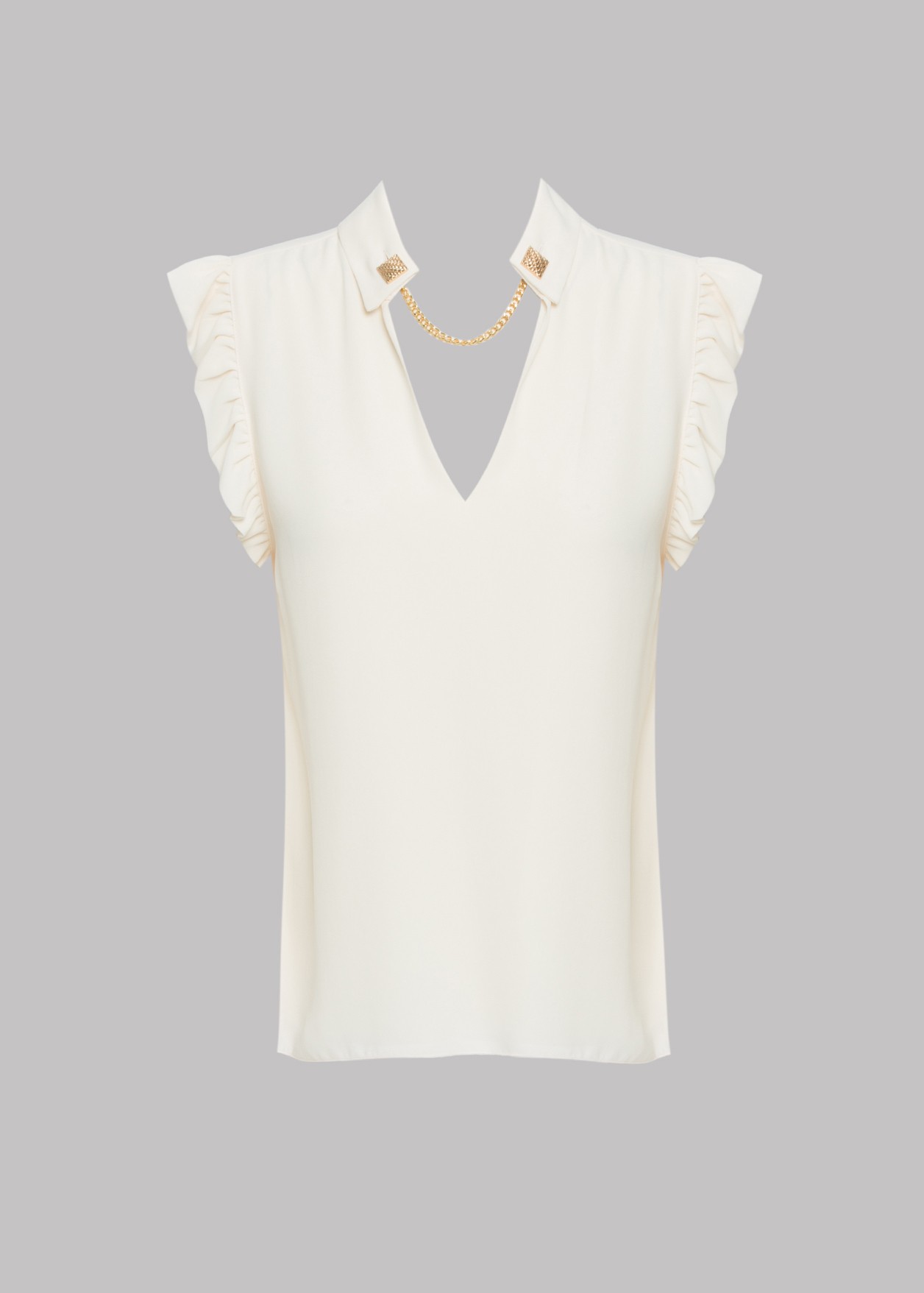 Short sleeve blouse with ruffles on the sleeves and decorative chain