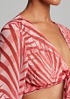 Printed top with a tie and bell sleeves