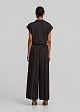 Cropped pleated trousers