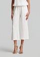 Cropped trousers in a linen-look fabric