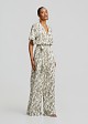 Ολόσωμη εμπριμέ φόρμα με ζώνη