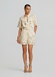 Linen playsuit with decorative lace