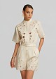 Linen playsuit with decorative lace