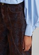 Barrel jeans with a velvet brocade print