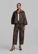 Printed velvet-effect brocade barrel-leg trousers