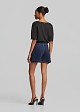 Denim shorts in statement pins