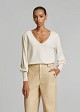 V-neck knit top with a relaxed fit