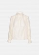 High-neck blouse with an internal lace lining