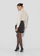High-neck blouse with an internal lace lining