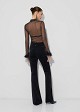 Sheer top with decorative feathers