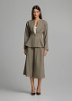Fitted peplum jacket with a round neckline