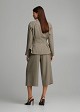 Fitted peplum jacket with a round neckline